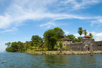 Fototapeta na wymiar Spanish colonial fort at the entrance to Lake Izabal in eastern Guatemala, Castillo de San Felipe.