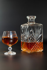 Glass of brandy and a carafe