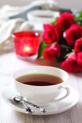  Valentine's Day: Romantic Tea Party with candle and bouquet of