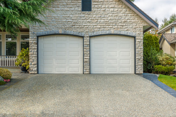 Fototapeta premium Fragment of a luxury house with a garage door in Vancouver, Canada.