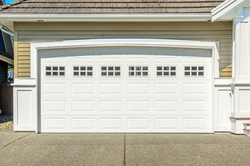 Fototapeta premium Fragment of a luxury house with a garage door in Vancouver, Canada.