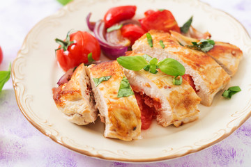 Grilled Chicken breast stuffed with tomatoes, garlic and basil