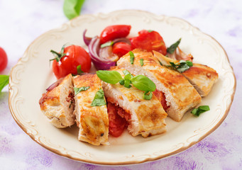 Grilled Chicken breast stuffed with tomatoes, garlic and basil