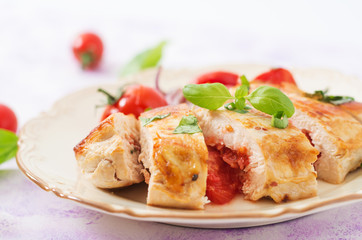 Grilled Chicken breast stuffed with tomatoes, garlic and basil