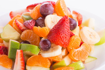 Closeup of a colorful fruit salad on a plate