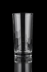 Empty glass closeup on black background