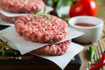Raw burger and spices