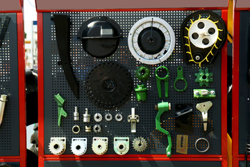Naklejka premium Stand with spare parts and tools for heavy equipment on agricultural exhibition