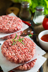 Raw burger and spices