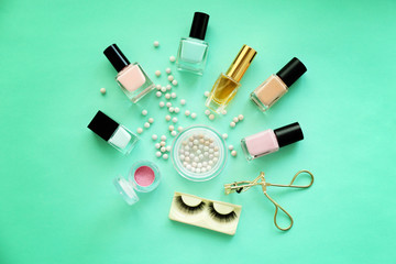 Set of decorative cosmetics on color background