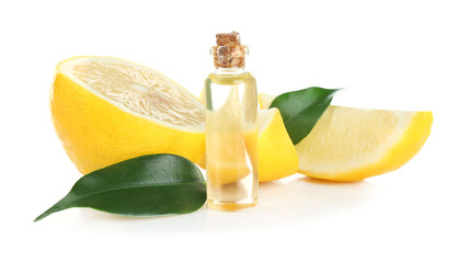 Beautiful spa composition with lemon essential oil on white background, closeup