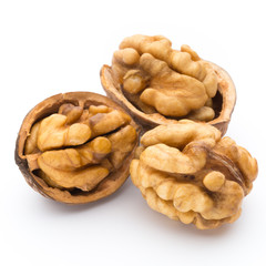 Walnut and walnut kernel isolated on the white background.