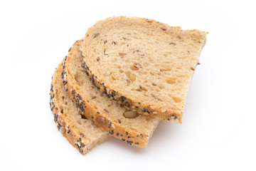 White bread sliced wholegrain bread on a wooden table.