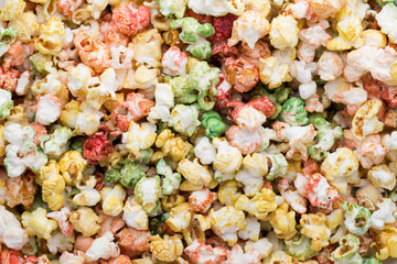 Colored Popcorn texture background. Sweet popcorn.