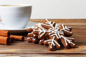Closeup Gingerbread cookies, Cinnamon and cup of coffee