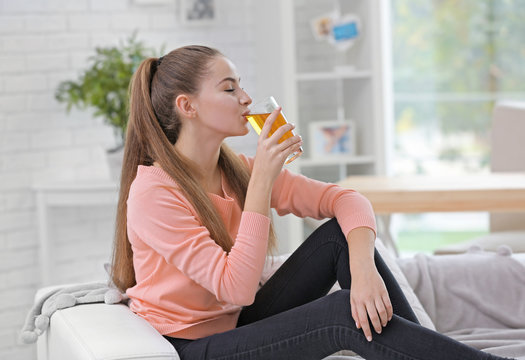 Young Beautiful  Woman Drinking  Juice