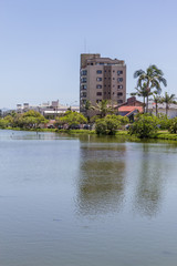 Fototapeta premium Buildings reflecting on the lake in Torres