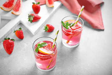 Glasses of refreshing drink on table