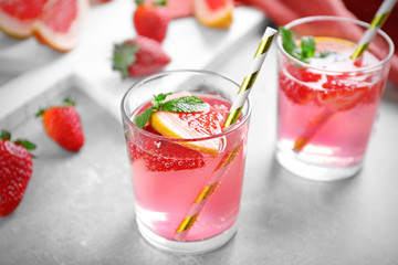 Glasses of refreshing drink on table