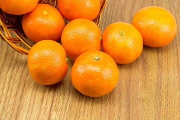 Ripe tangerines in the basket