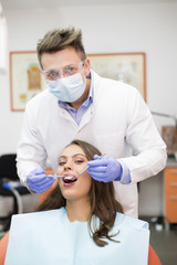 Fototapeta na wymiar Young woman at the dentist