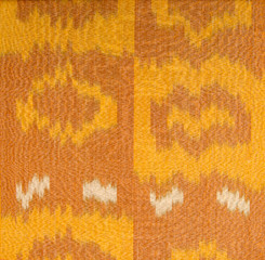 background from the tissue and textile with oriental ornate ornament and pattern gold color