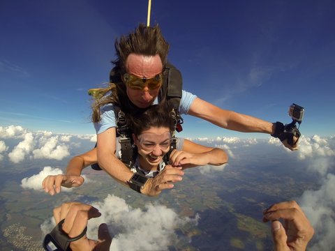 Skydiving tandem couple pov