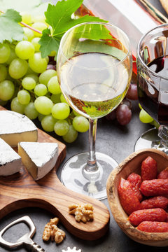 Wine, grape, cheese, sausages