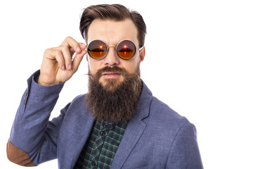 Studio shot of a handsome stylish man with beard and mustache we