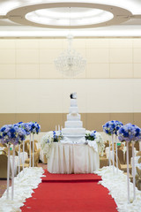 White wedding cake with flower