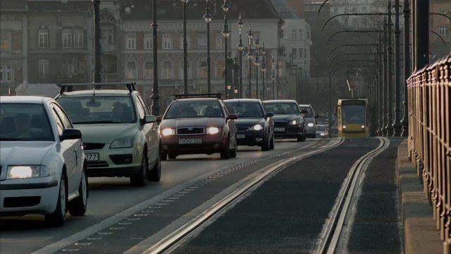 Traffic Margit bridge, Hungary.Bakground is old town