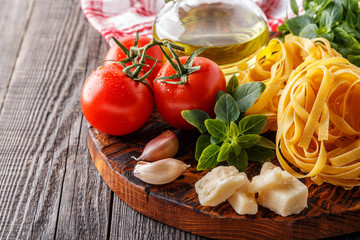 Cutting board with ingredients, selective focus.
