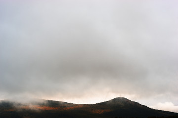 Autumn cloudy mountain landscape background