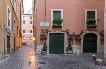 Fototapeta na wymiar Deserted street in Rome, Italy