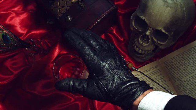 4k Abstract Halloween Background Composition with Skull, Dropping Poison Glass