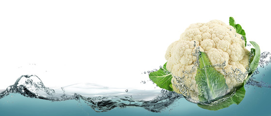 Broccoli on a background of splashing water.