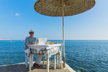 Man at the table for lunch at Navy pier