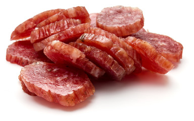 Salami smoked sausage slices isolated on white background cutout