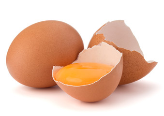 Broken egg in eggshell half and raw egg isolated on white backgr