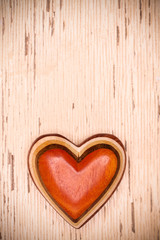 One wooden heart on rustic wood background. Valentines days conc