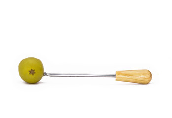 Green olive stuffed with anchovie on a stick.