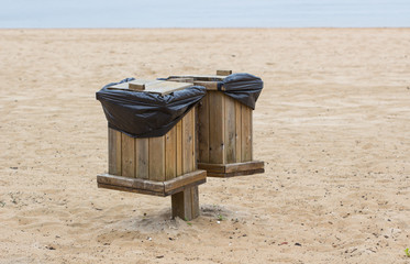 Wood bins on the beach / Bins wooden on the beach white sand