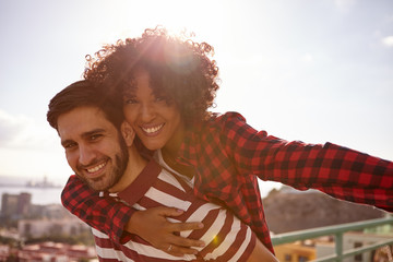 Smiling for camera young milennial couple