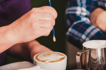 Fototapeta na wymiar Latte art on the cup