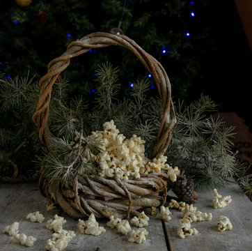 New Year or Christmas composition with POPcorn, mulled wine, hazelnuts