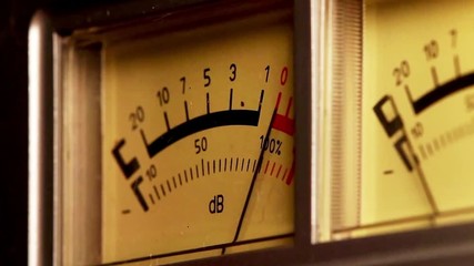 Analog sound meter, black and red line with yellow lighting