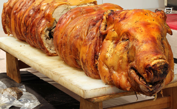 roast pork cooked and the big nose in the rotisserie