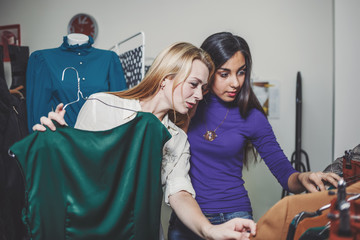 young girls in shopping mall, friends having fun together