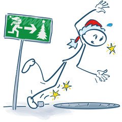 Strichmännchen als Nikolaus stolpert in ein Loch