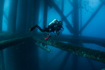 Scuba Diver oil rig